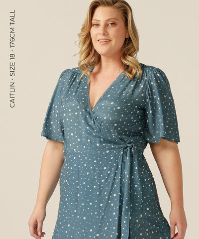 tailored wrap dress with pockets made from breathable fabric.