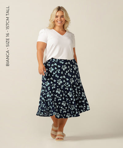 Pull-on skirt with pockets and ruffle.