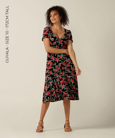 the Jillian Dress is a summer dress with sweetheart neckline and deep ruffle hem. Designer fashion, she features en exclusive floral print and is made in Australia by fit experts, Leina and Fleur for plus size women, petite sizes and fashion-conscious women building capsule wardrobes for work and travel