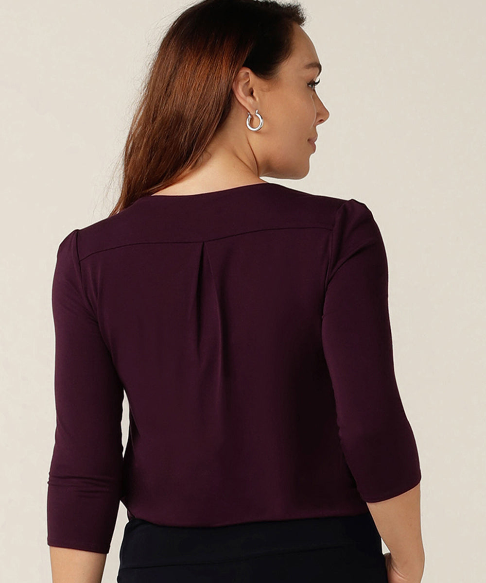 tailored top with round neckline and 3/4 length sleeves