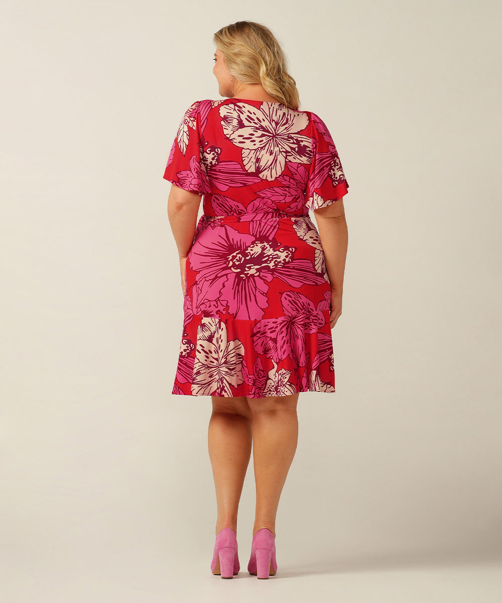 short jersey wrap dress with fluted sleeves and frill hemline. Made in Australia for petite to plus size women.