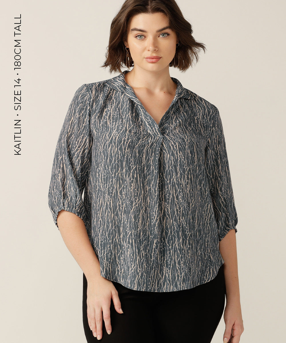 Chic Tailored Top with Collar in Breathable Fabric.