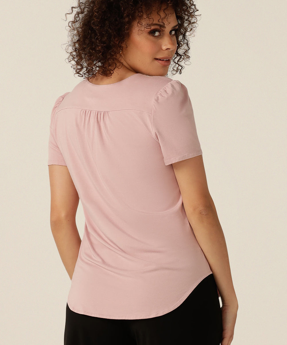 tailored short sleeve top with v-neckline and shirttail hemline