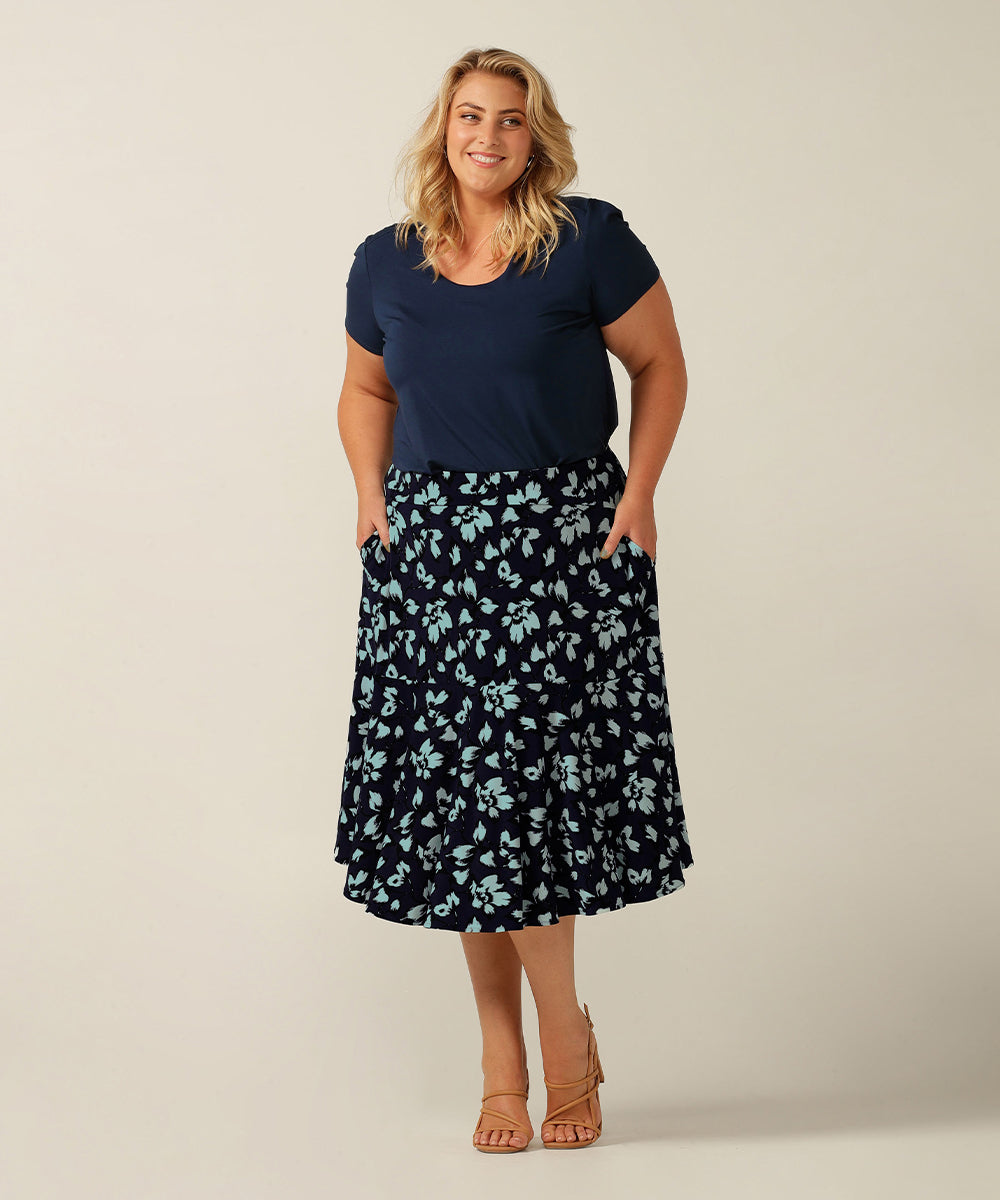 Pull-on skirt with pockets and ruffle.