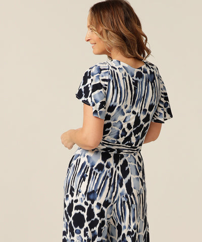 Back of jersey jumpsuit with flutter sleeves, wrap bodice and cropped length. Made in Australia for petite to plus size women. 