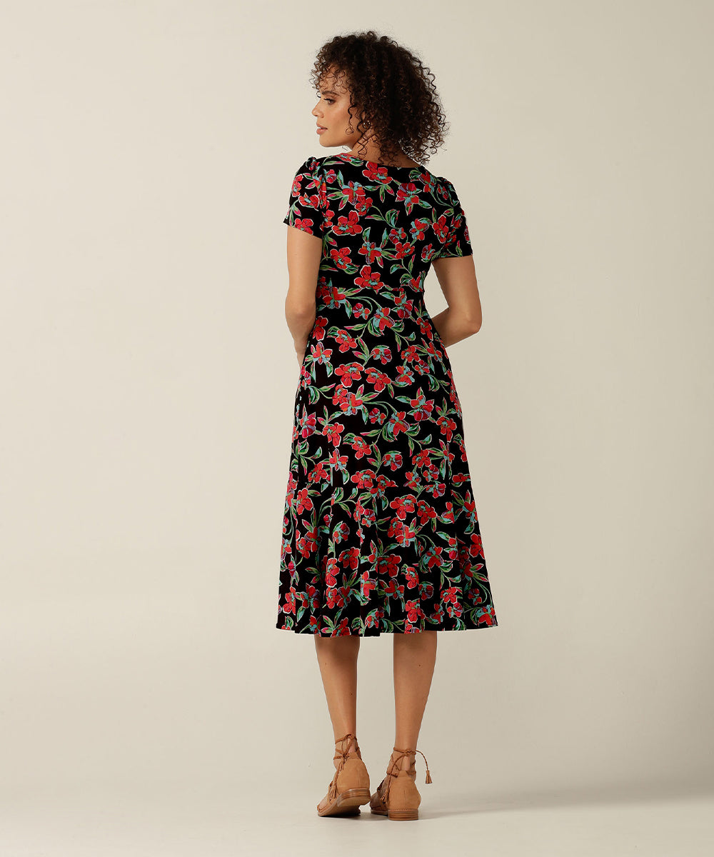 the Jillian Dress is a summer dress with sweetheart neckline and deep ruffle hem. Designer fashion, she features en exclusive floral print and is made in Australia by fit experts, Leina and Fleur for plus size women, petite sizes and fashion-conscious women building capsule wardrobes for work and travel