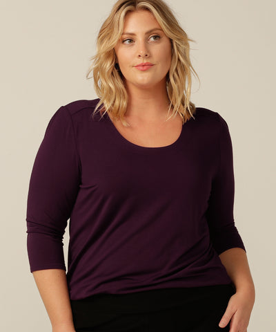 tailored top with round neckline and 3/4 length sleeves