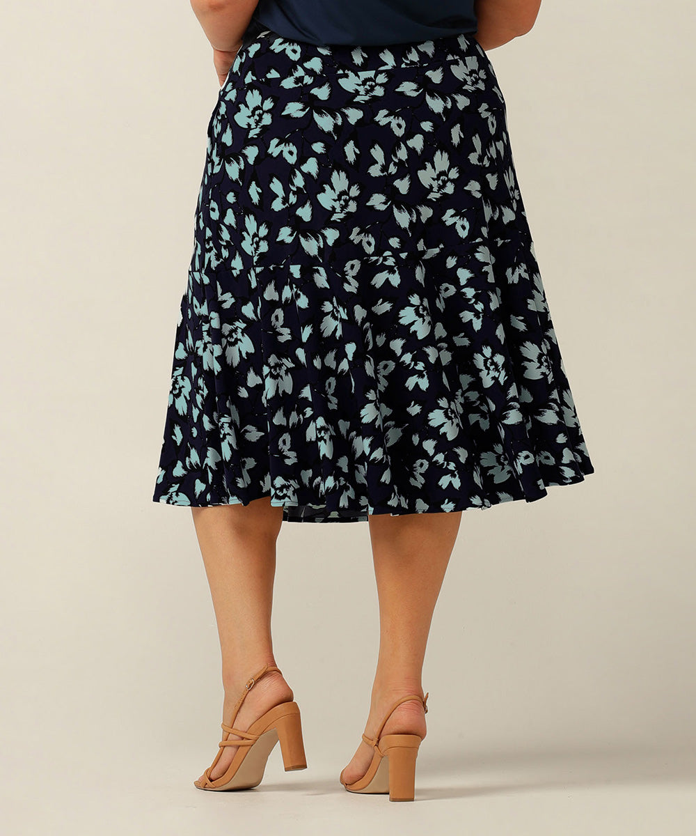 Pull-on skirt with pockets and ruffle.