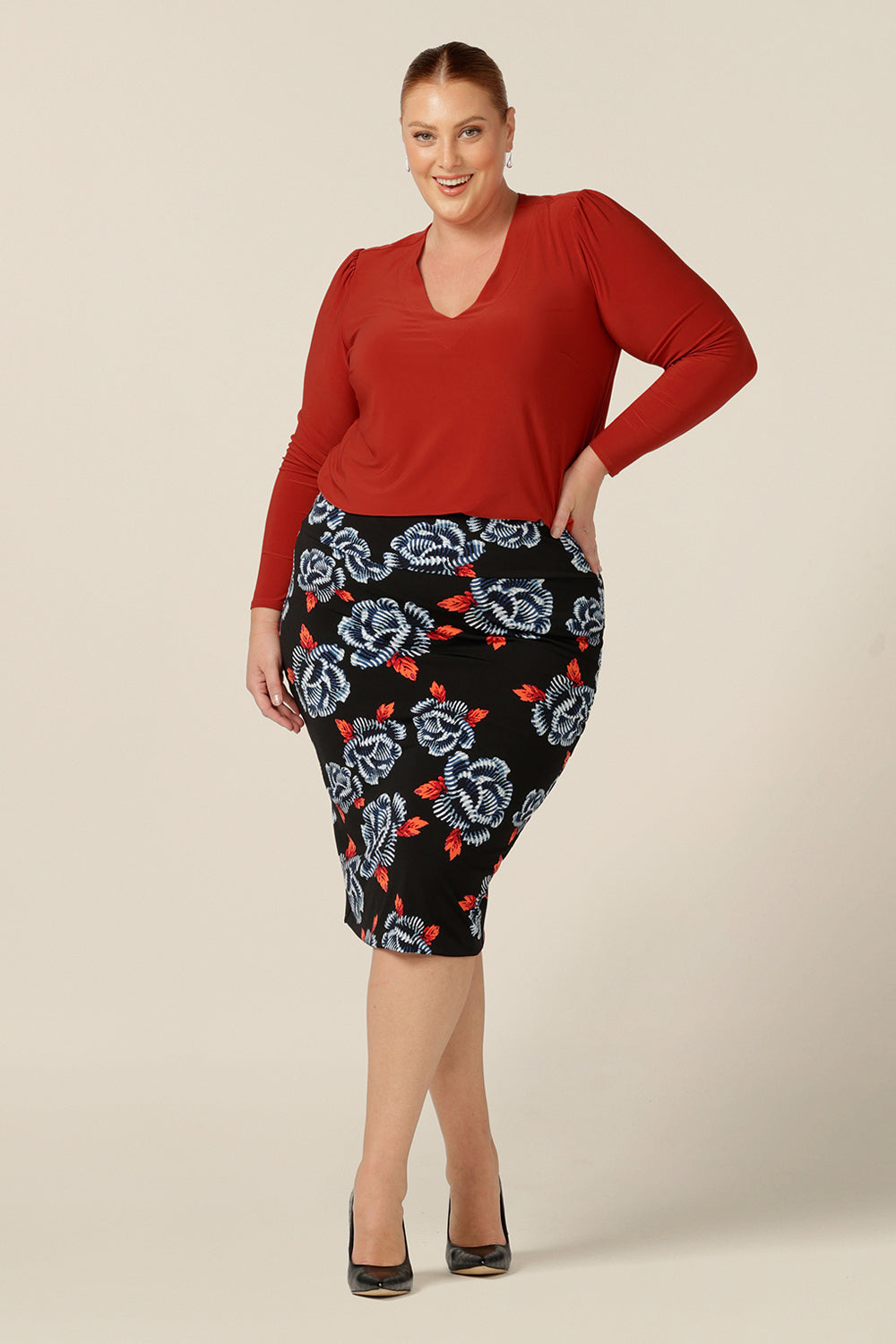 Tops for petite to plus size women, L&F's great range of women's tops includes this V-neck jersey top with long sleeves. In orange dry-touch jersey, this coloured top is worn with a floral print tube skirt for an office look.