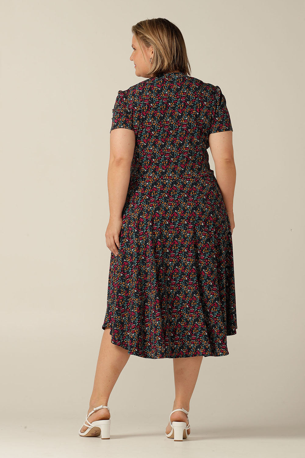 Short sleeve dress with gather front bodice and full, knee-length skirt made in Australia in stretch jersey