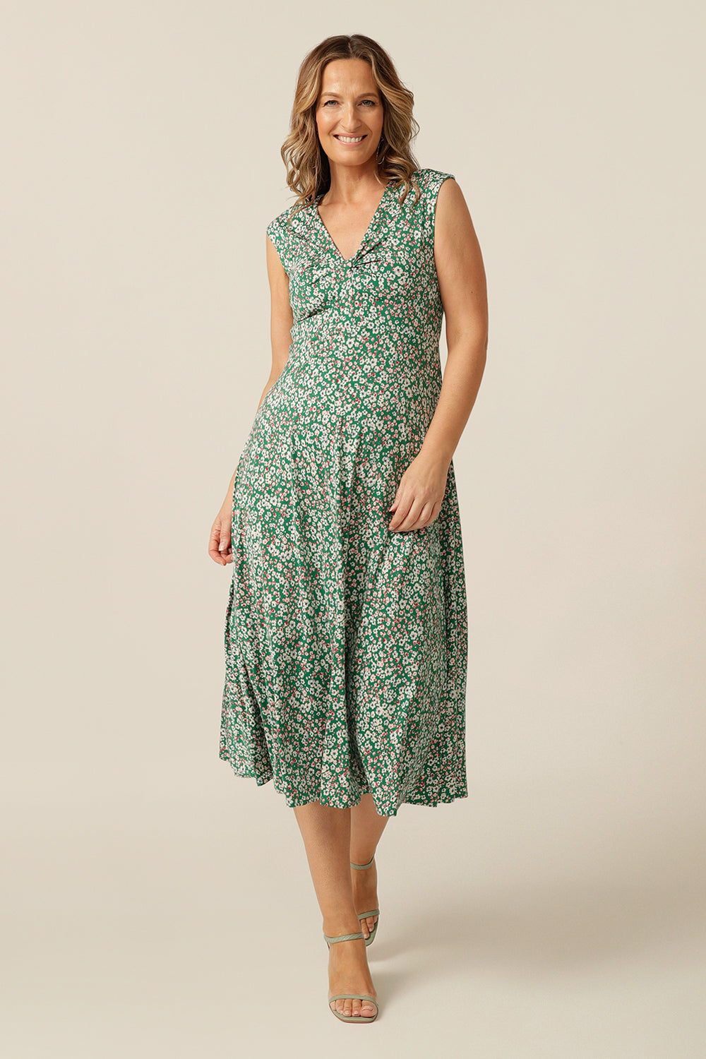 Sleeveless summer jersey dress with twist front bodice and below-the -knee skirt. The best dress for parties, summer events and barbeques! Made in Australia for petite to plus size women.