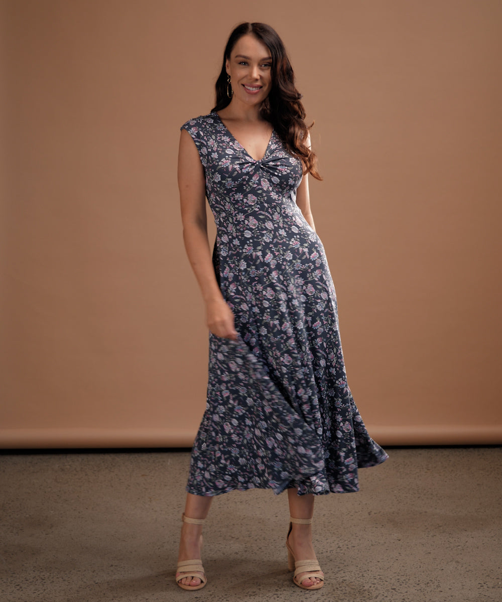Sleeveless summer dress with twist front bodice