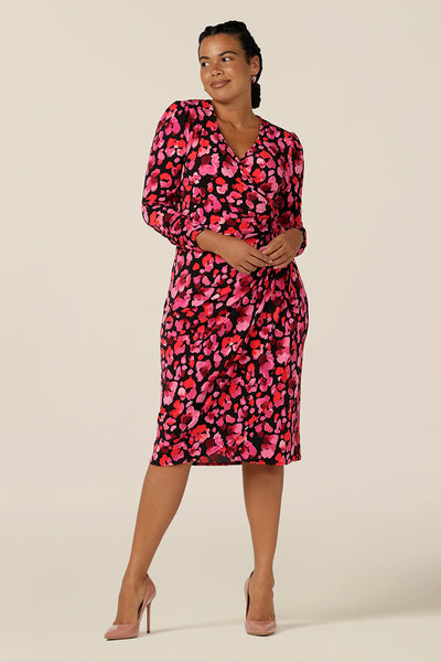 A great mother-of-the-bride or mother-of-the-groom dress, this luxe jersey wrap dress features long sleeves and a knee-length tulip skirt. Shown here in a size 12, this wrap dress is available in sizes 8 to size 24. Australian-made you can be sure of the quality and craftsmanship of this occasion wear and event dress.