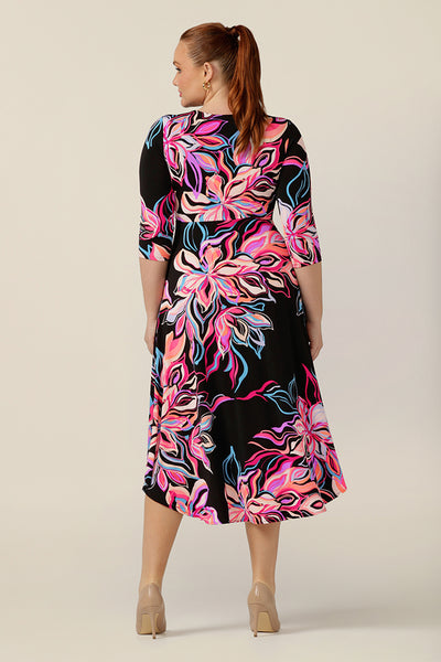 Shop alternative corporate dresses and invest in this Australian-made floral print jersey dress by Australian and New Zealand womenswear brand L&F. Featuring a V-neck with twist detail, 3/4 sleeves and a full skirt, shop this work wear dress in petite to plus sizes.