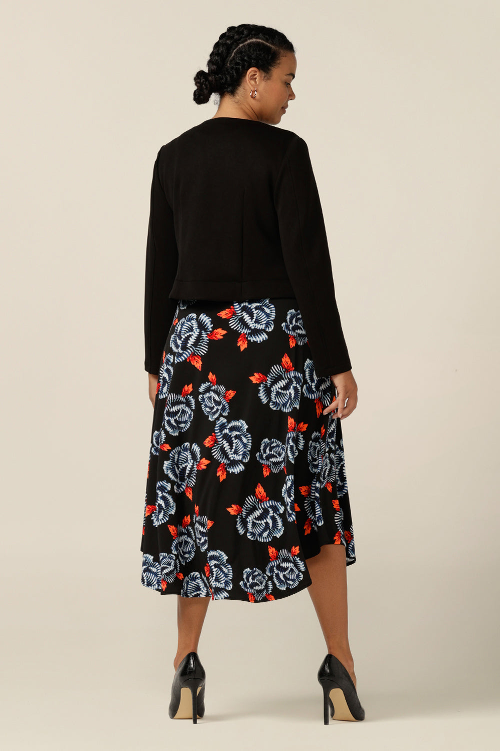 Wear it for work - a 3/4 sleeve, empire line dress in black-base floral print jersey is worn under a black soft tailoring jacket. shop L&F work dresses and jackets in sizes 8 to size 24.
