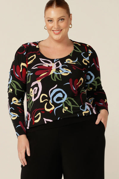 a round neck, long sleeve top for plus size and fuller figure women. In an abstract print with black base, this comfortable top is made in Australia in an inclusive 8-24 size range.