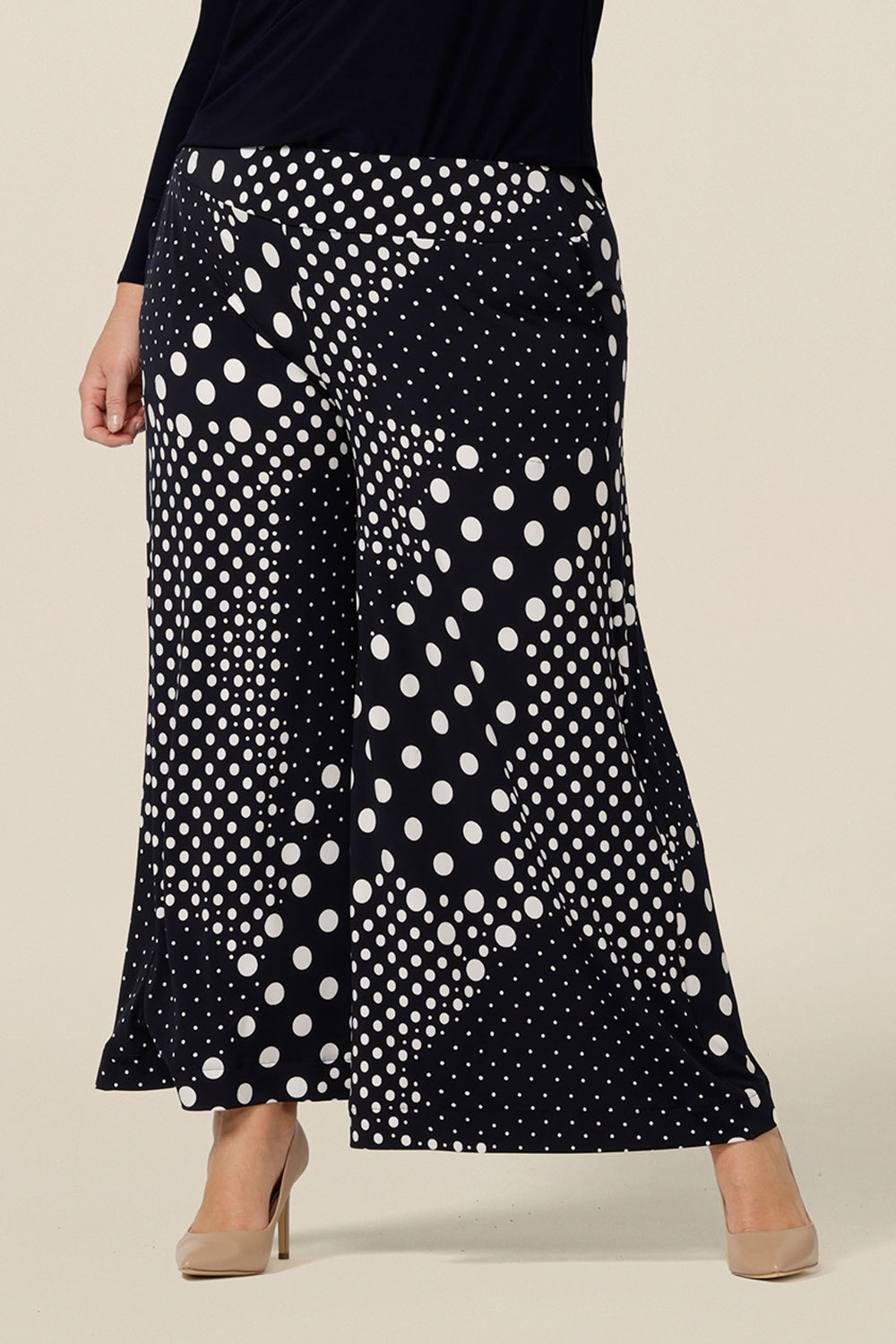 Good for work and corporate wear with a difference, these are navy and white polka dot print, wide leg pants.  Shop these Australian-made, stretch jersey pants online at elarroyoenterprises Australia and New Zealand.