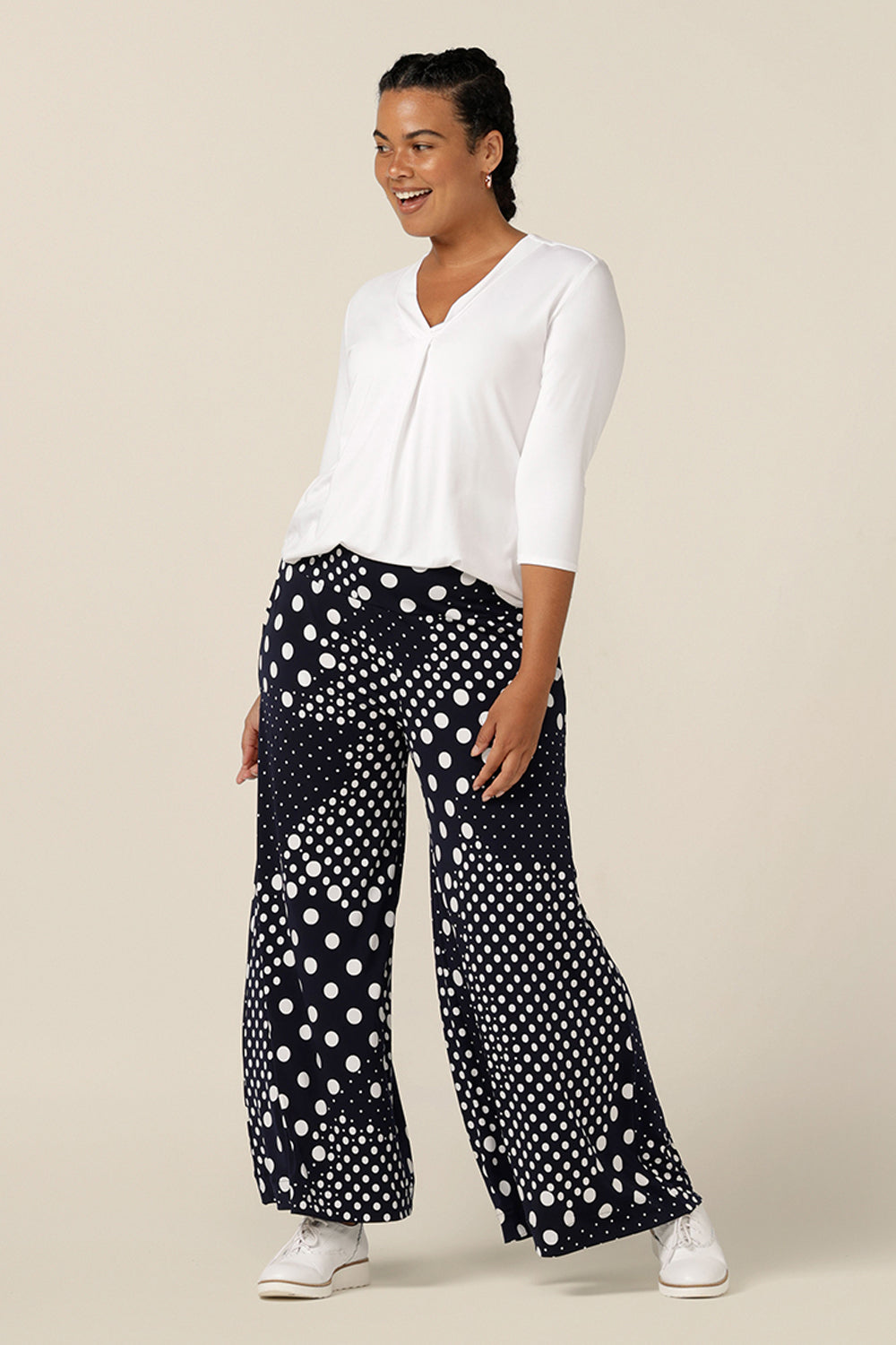 Styled as comfortable, casual trousers, L&F's navy and white, wide leg pants are worn with a bamboo jersey top in white. 