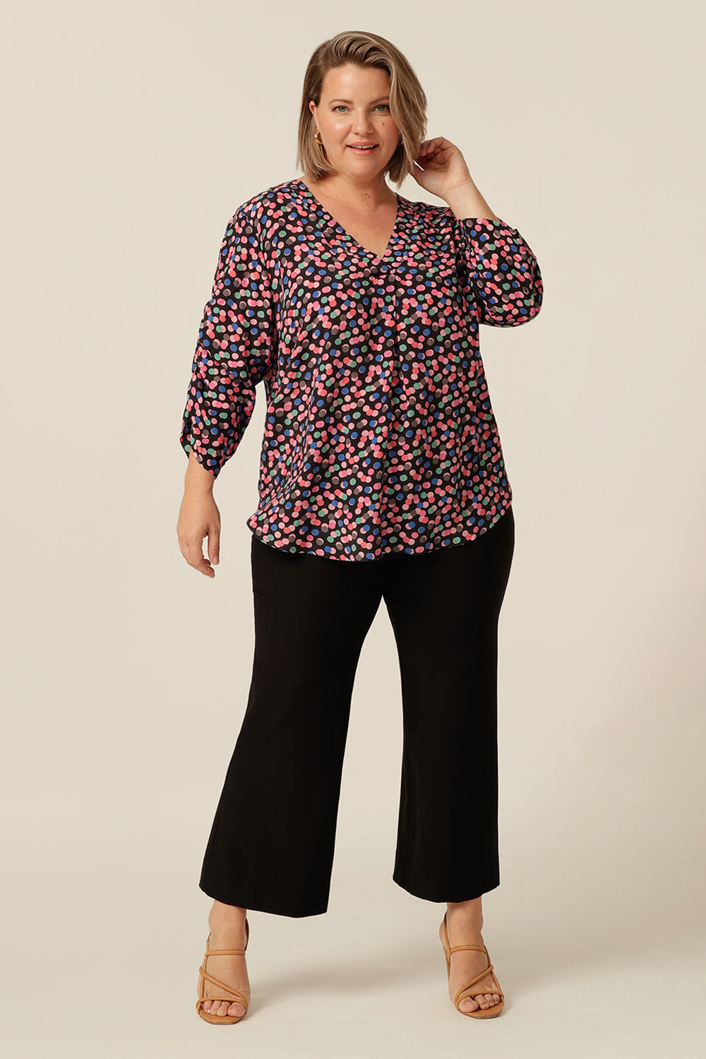 eco-conscious, lightweight V-neck top with ruched 3/4 length sleeves 