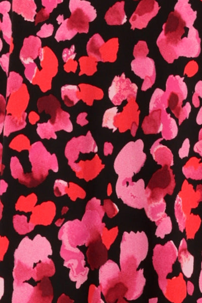 fabric swatch of red poppy print on black dry-touch jersey used by Australia and New Zealand women's clothing company, L&F to make a range of women's work and event tops.