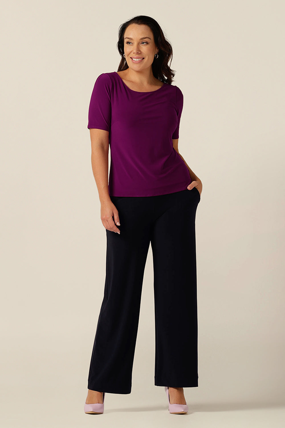 simple line, softly tailored magenta jersey top with boat neckline and short sleeves