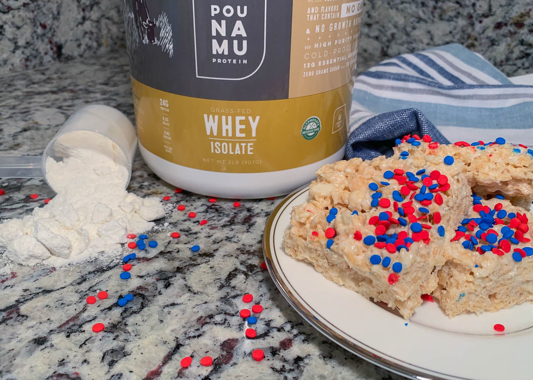 Pounamu Protein forth of July Protein Rice Krispie Treats with red and blue sprinkles on top