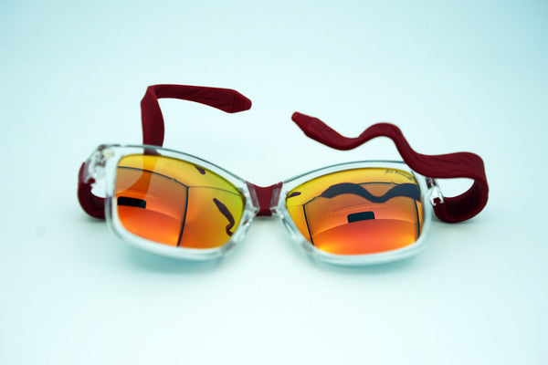 clear framed beandit sunglasses with red arms