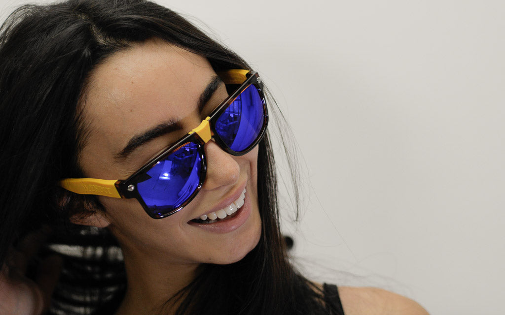 Female model wearing Beandit sunglasses