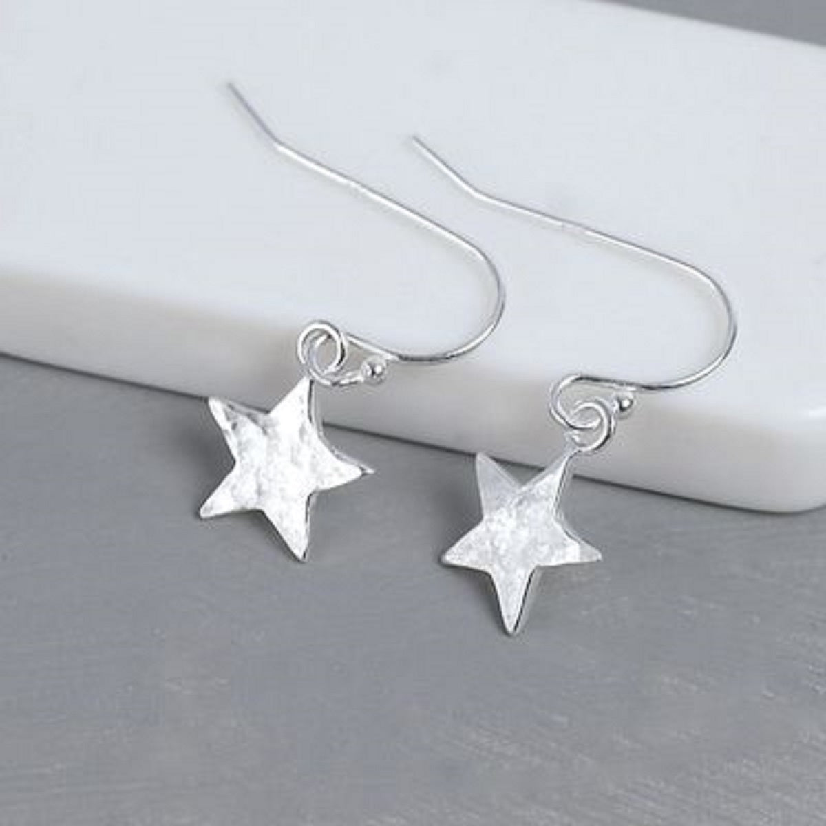 Silver Star Dangly Earrings