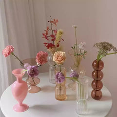 glass colourful vases + candlestick holders