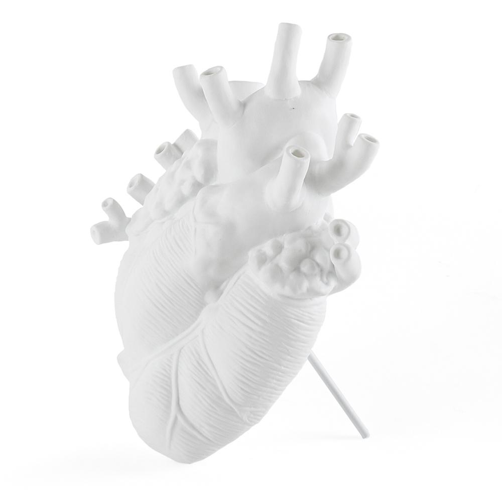 Porcelain Heart Vase: White on its included stand.