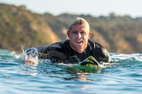 Mick fanning 3 time world champion surfer.