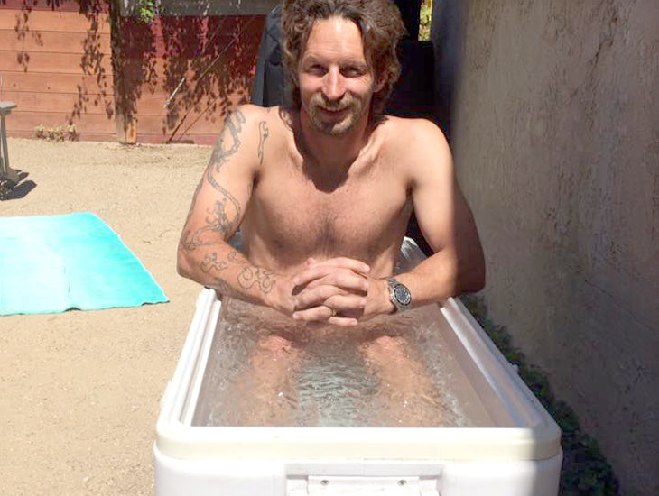 Nik in the ice bath aka large cooler from Costco