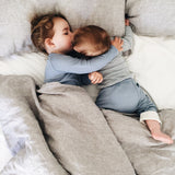 blue for boys and girls - cozy mornings in bed in roots & wings organic merino