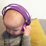 Getting the tunes on in her grey marle bodysuit from roots & wings merino