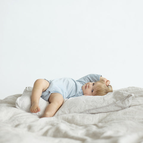 toddler on merino wool blanket