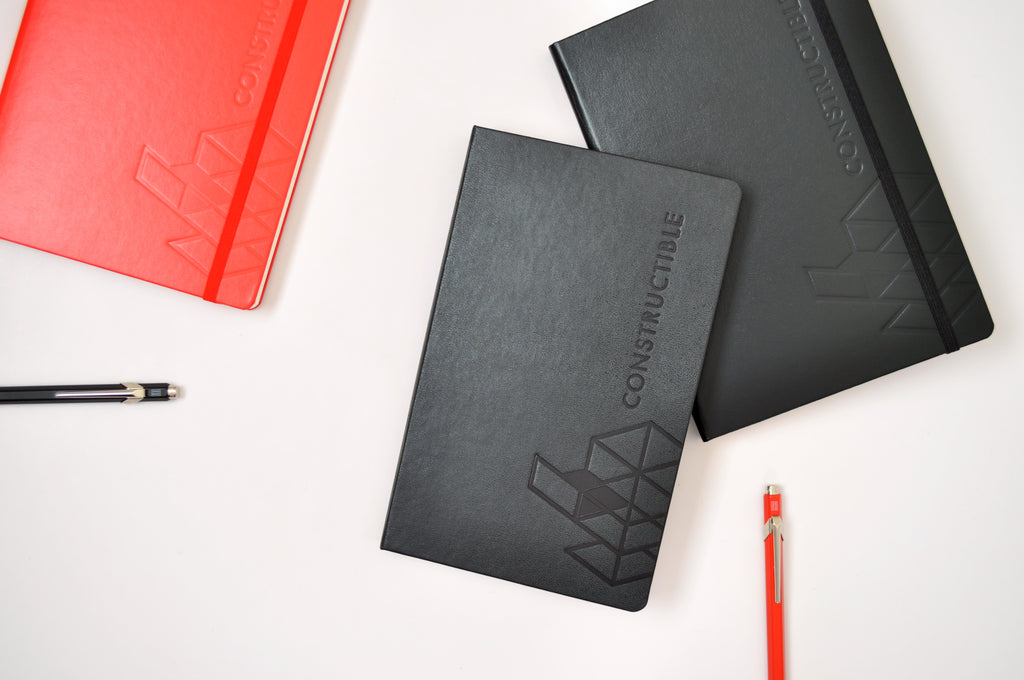 Constructible custom logo embossed notebooks