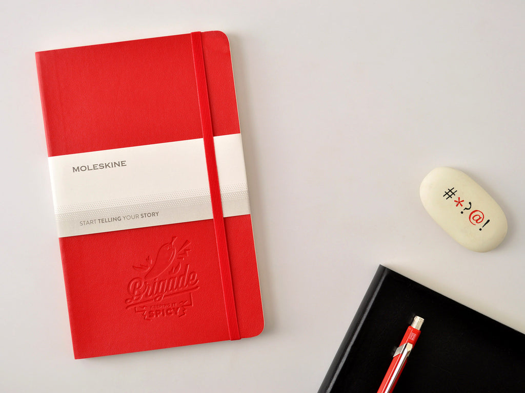 Custom logo embossed Moleskine softcover notebook in scarlet red 