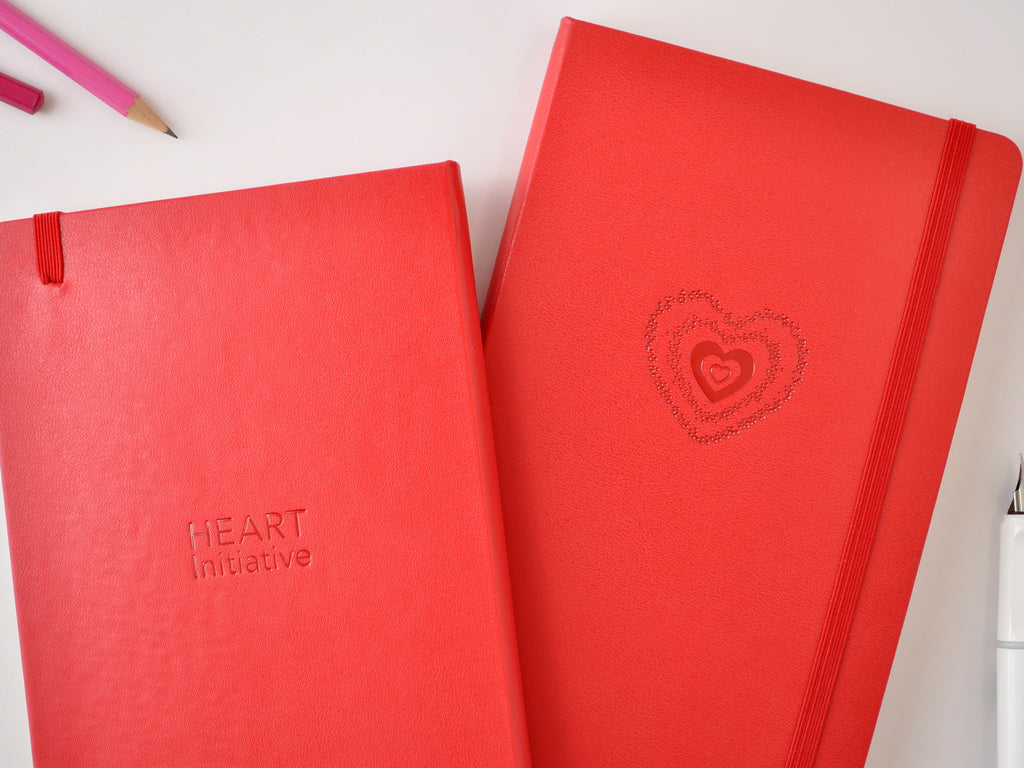 Red Moleskine Hardcover notebooks with logo imprints for HEART Initiative