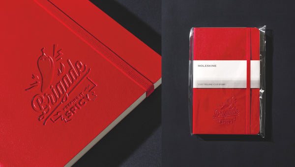 Custom logo embossed Moleskine notebook in red softcover