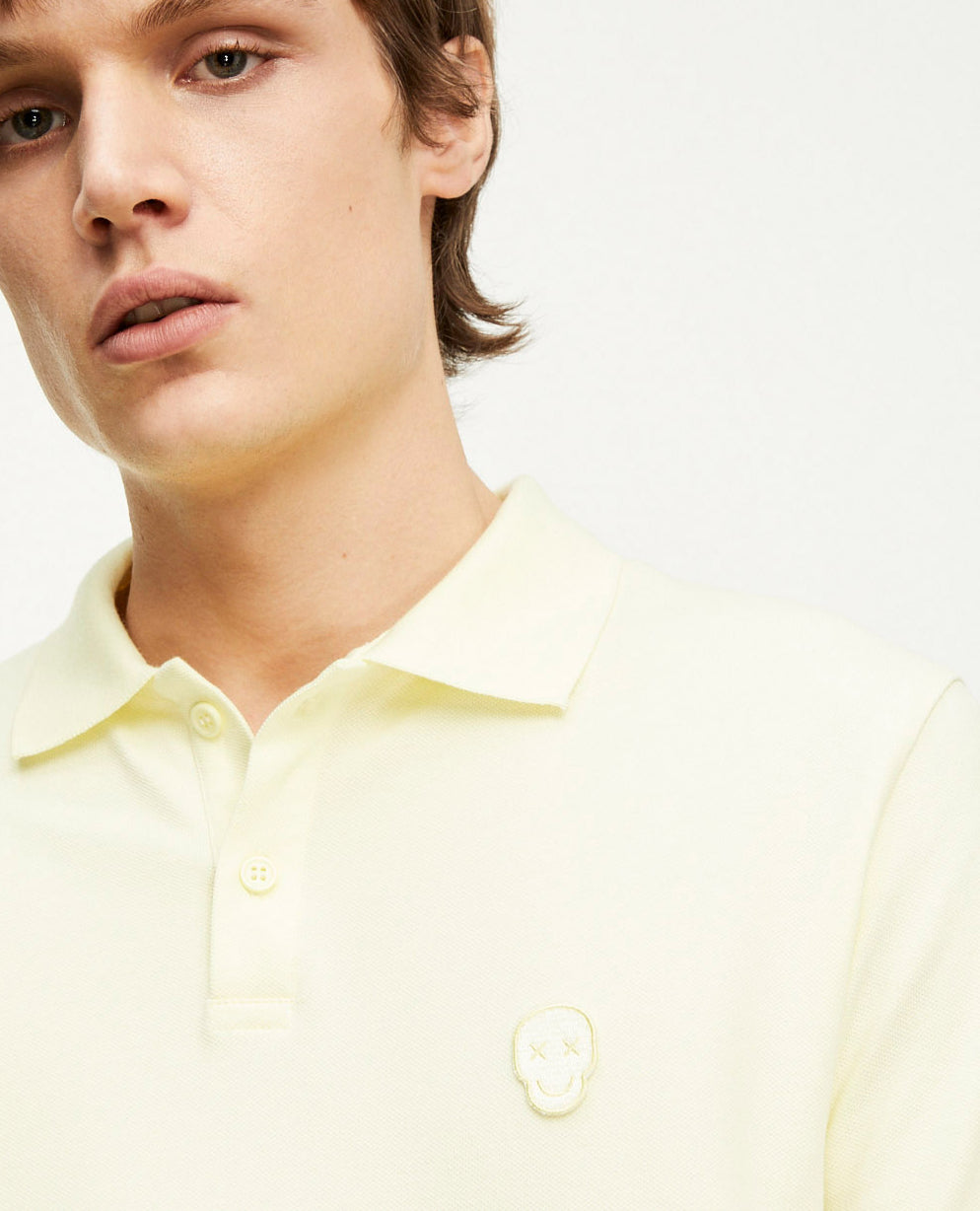 Polo jaune clair broderie tête de mort The Kooples seconde vie