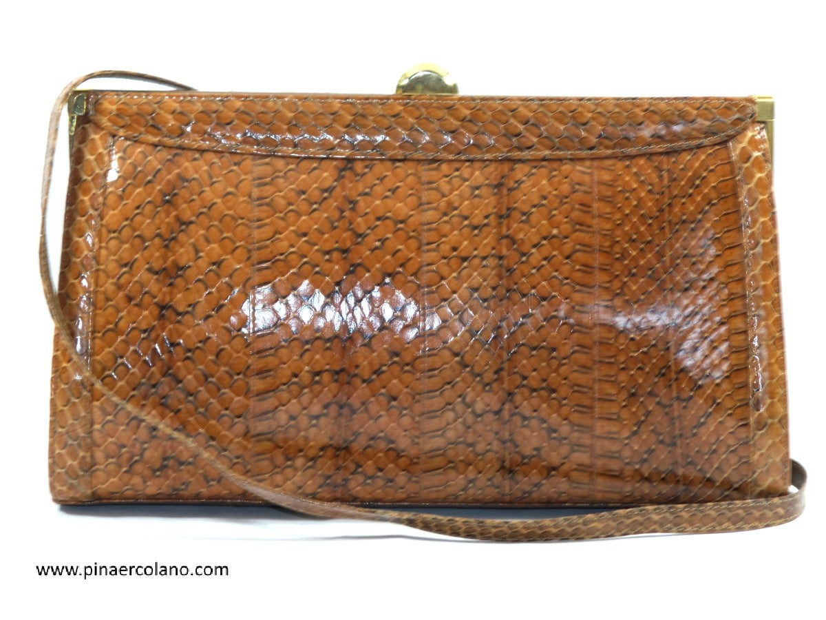 Pochette busta a mano con catenina