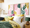 over the bed pink green and mustard jungle vibe prints