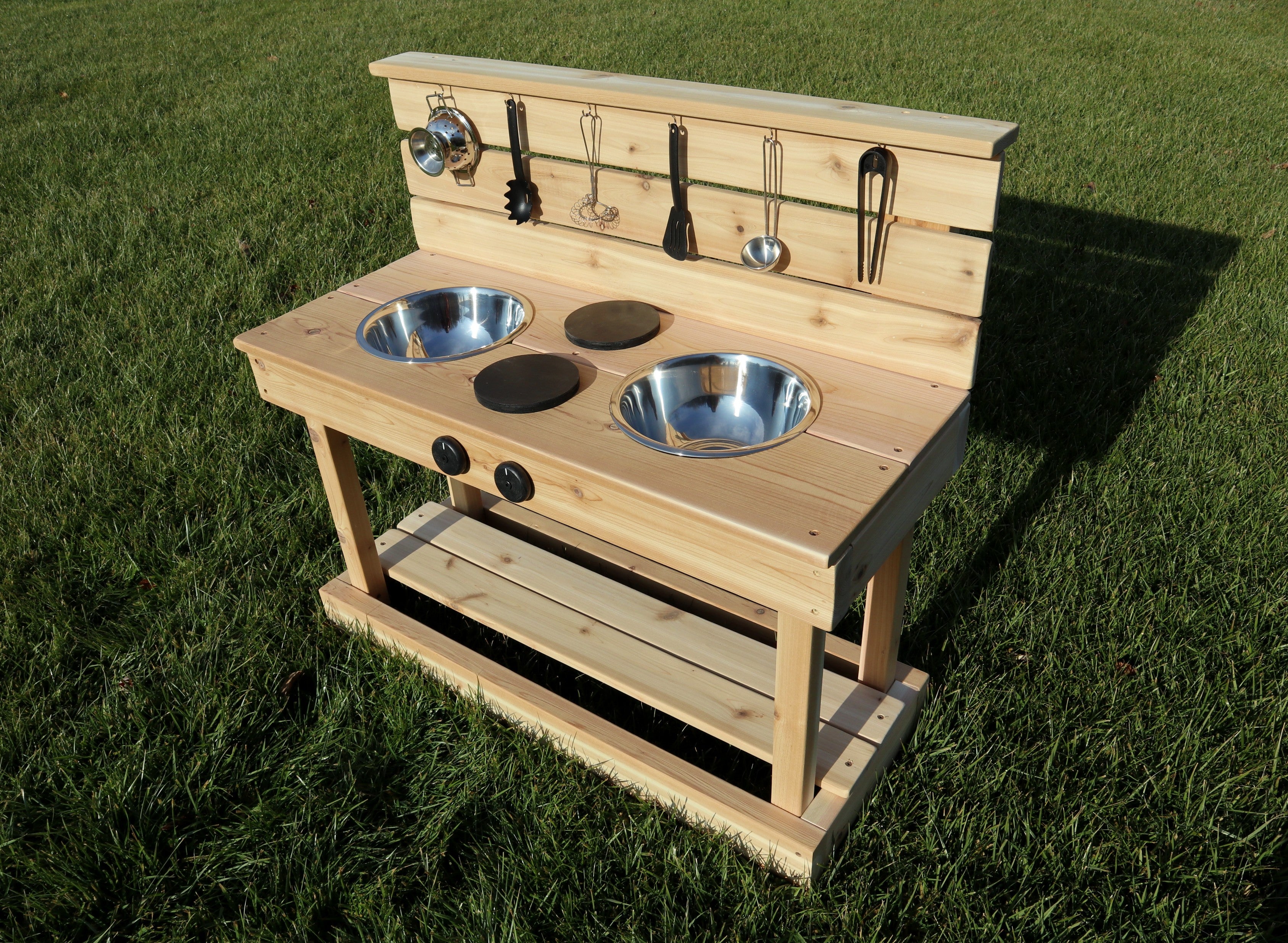 outdoor wooden mud kitchen