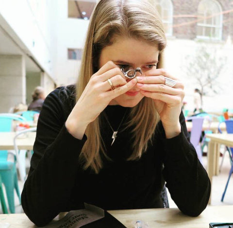 Jenny Huston Edge Only designer and founder. Using a jewellers loupe at the National gallery of Ireland