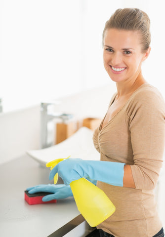 Women cleaning a surface