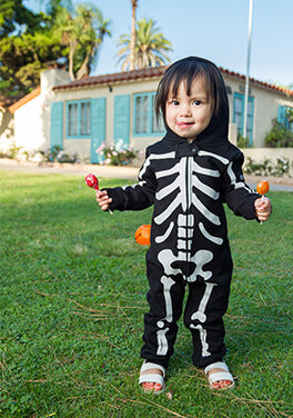 shop jumpsuits - image of baby in skeleton onesie jumpsuit