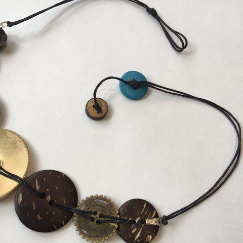 Makings of a button necklace 