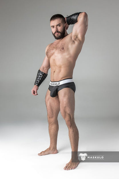 Armored. Rubber look Briefs. Detachable pouch. Open rear. Black