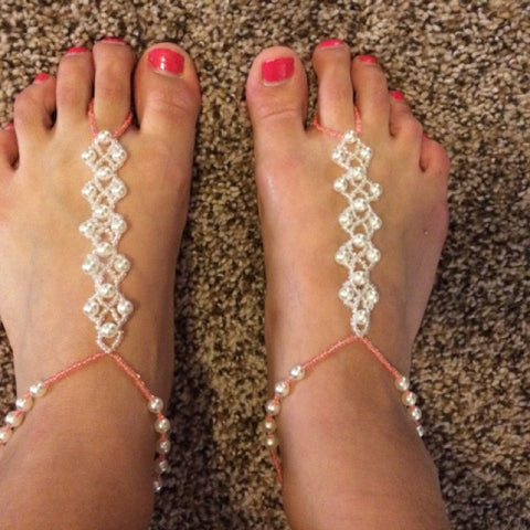 Nicole H wears coral barefoot sandals